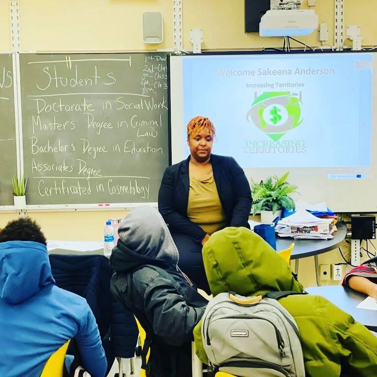 Founder Sakeena Anderson leading an Increasing Territories classroom session